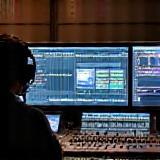 Sound mixer working on film audio